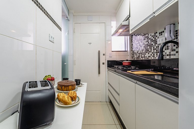 Kitnet Vista Mar em Santos | A/C + Wi-Fi e Vaga